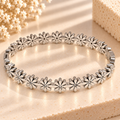 The Silver Daisy Bangle